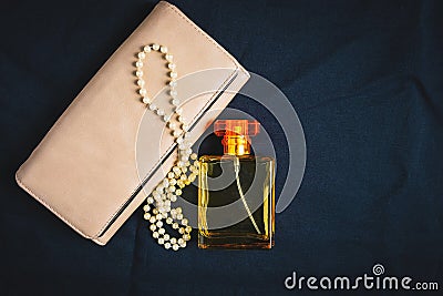 Perfume bottles and women handbags with beautiful jewelry Stock Photo