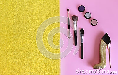 Perfume and cosmetics eye shadow, mascara, lip gloss, makeup brushes Stock Photo