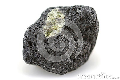 Peridot crystal and lava rock Stock Photo