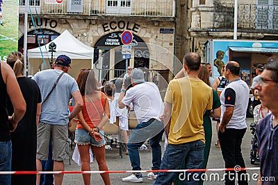 Perigueux, Dordogne, France June 03 2023 : United in Sports: Spectators Watching a Rugby Match Broadcast in a Public Square Editorial Stock Photo