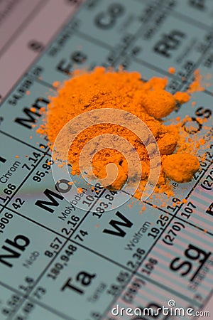 Periodic system table with orange powder element Stock Photo