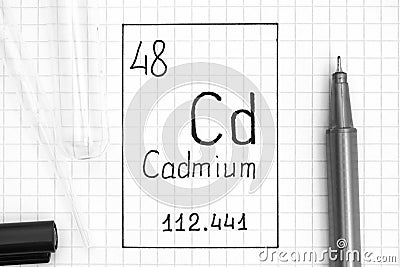 The Periodic table of elements. Handwriting chemical element Cadmium Cd with black pen, test tube and pipette Stock Photo