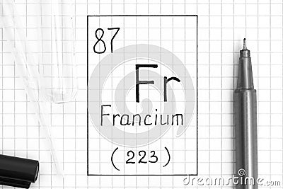 The Periodic table of elements. Handwriting chemical element Francium Fr with black pen, test tube and pipette Stock Photo