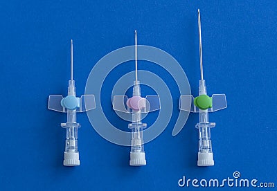 Peripheral venous catheters placed on the therapy trolley in the infirmary Stock Photo