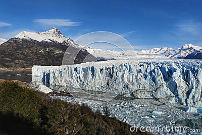 Perito moreno glacier calafate winter season vacations outdoors nature awe beauty landscape frozen lake snowy mountains Stock Photo