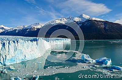 Perito moreno glacier calafate winter season vacations outdoors nature awe beauty landscape frozen lake snowy mountains Stock Photo