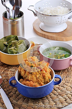 Perkedel Jagung or Bakwan Jagung, Indonesian Corn Fritters Made of Corn, Egg, Flour, Spring Onion, Pepper and Salt Stock Photo