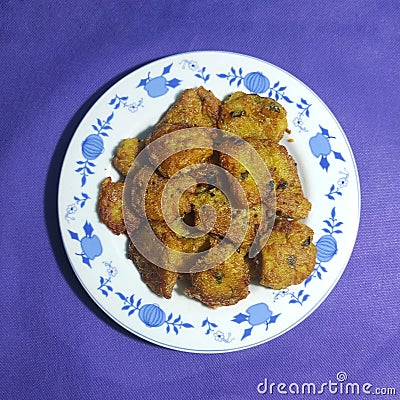 Perkedel are placed on a plate. Perkedel is an Indonesian food made from fried potatoes and eggs Stock Photo