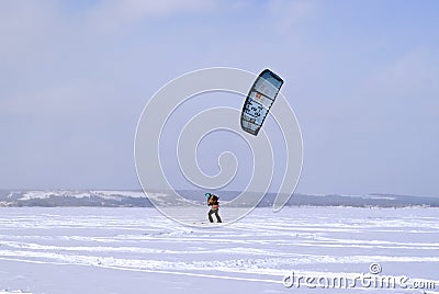 Snowkiter on the ice of the Kama Reservoir Editorial Stock Photo