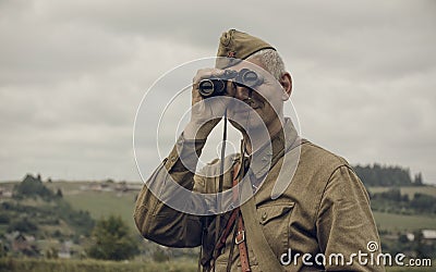 PERM, RUSSIA - JULY 30, 2016: Historical reenactment of World War II, summer, 1942. Soviet officer Editorial Stock Photo