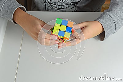 Perm, Russia, November 02 2020: A logic toy in the hands of a boy. Editorial Stock Photo