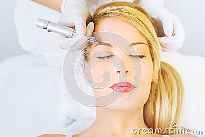 Permanent make up on eyebrows Stock Photo