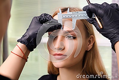 Permanent make up on eyebrows. Stock Photo