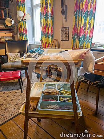 Permed in the Past: A Cluttered 1960's Copenhagen Apartment Living Room Stock Photo