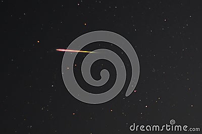 Perseid meteor in the night sky Stock Photo