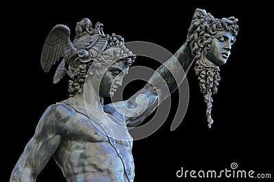 Perseus holding the head of Medusa on black background,Florence Stock Photo