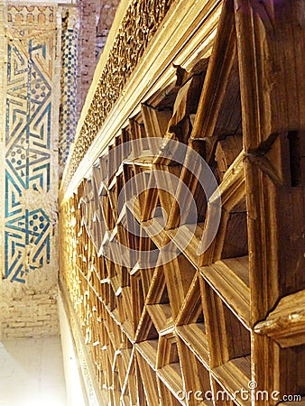Persian wooden geometric decorations and ancient colored tiles in the interior of Soltanieh Dome,Zanjan,Iran. Stock Photo