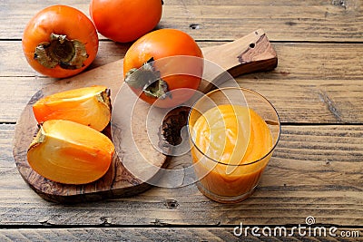 Persimmon fruit and smoothie Stock Photo