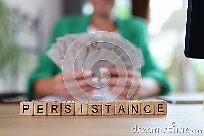 Persistence word collected with wooden cubes in row Stock Photo