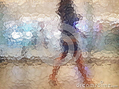 person behind glass.Shadow abstract background. Stock Photo