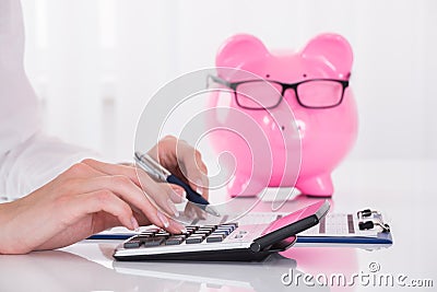 Person Calculating Bill Stock Photo