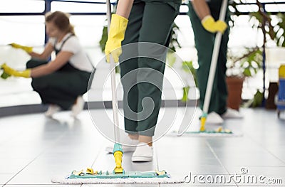 Person cleaning the floor Stock Photo