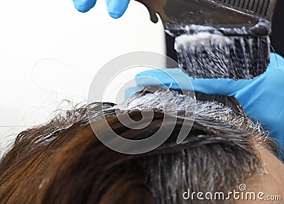 Person coloring hair Stock Photo