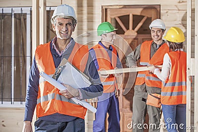 4 person Construction Crew Stock Photo