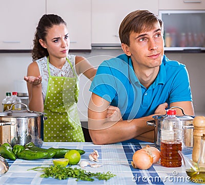 Person criticizing young spouse Stock Photo