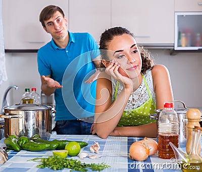 Person criticizing young spouse Stock Photo