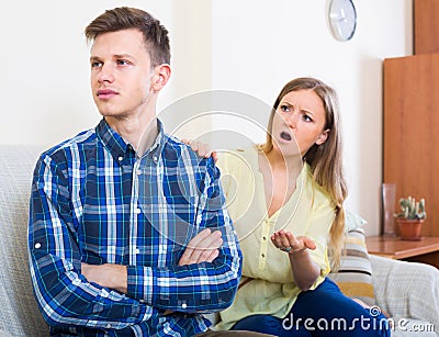 Person criticizing young spouse Stock Photo