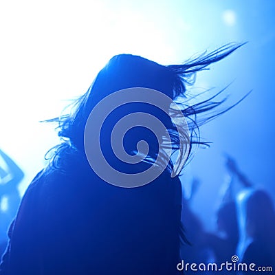 Person, dancing and crowd or live concert silhouette or music performance or festival, rock or friends. Audience, club Stock Photo