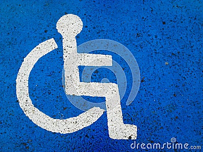 Disabilities street sign on blue background Stock Photo