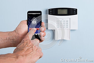 Person disarming system with remote control Stock Photo