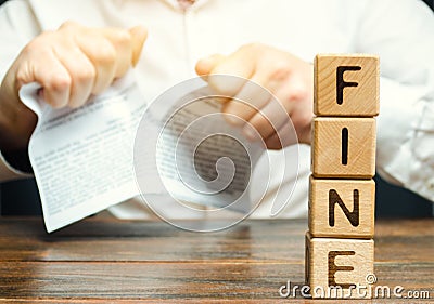 A person disputed the illegal fines and taxes. Unfair tariffs and penalties. Proof of innocence and exemption from payment. Stock Photo