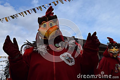 Person dressed in a festive costume celebrating the Fasching carnival parade in Germany Editorial Stock Photo