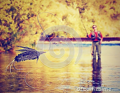 A person fly fishing Stock Photo