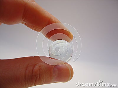 Person with glass bead Stock Photo