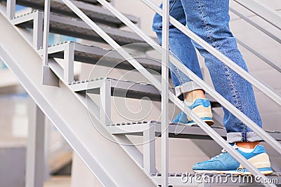 a person going up the ladder career concept Stock Photo