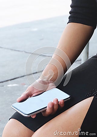 Person Hand Using A Generic Smart Phone Stock Photo