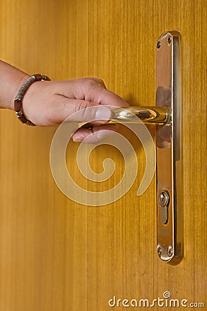 Person holding door handle Stock Photo