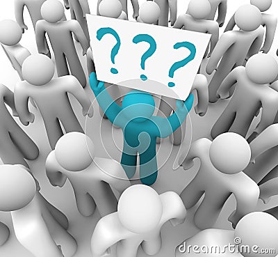 Person Holding Question Mark Sign in Crowd Stock Photo