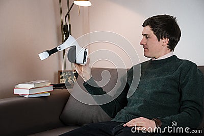 Person holding VR glasses Stock Photo