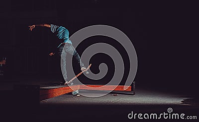 Person jumping with skateboard street Editorial Stock Photo
