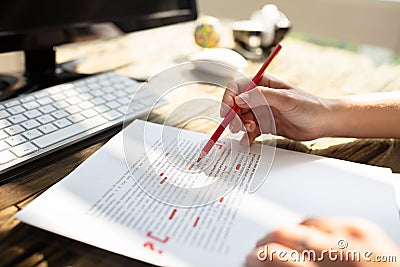 Person Marking Error With Red Marker Stock Photo