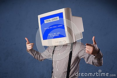 Person with a monitor head and fatal error blue screen on the di Stock Photo