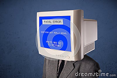Person with a monitor head and fatal error blue screen Stock Photo