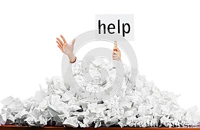 Person in pile of papers Stock Photo