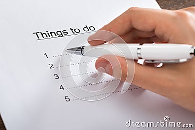 Person Planning List Of Work To Do Stock Photo
