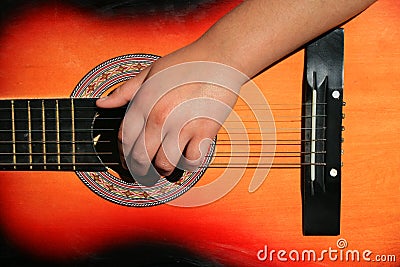 Person Playing Guitar Stock Photo